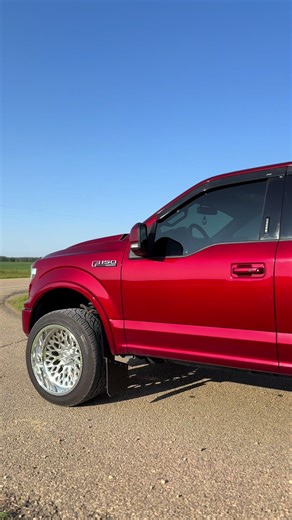 Exploring Ruby Red Ford F150 on a Sunny Day