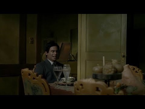 House of Wax (2005) - Man peeks through window of wax museum of a virtually ghost town of Ambrose.