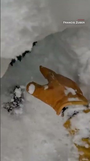 Skier spots snowboarder buried under snow. See what he did next