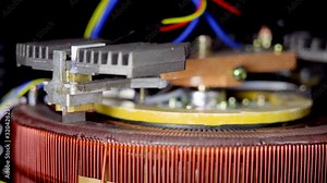 Operation of the autotransformer in the automatic voltage stabilizer when regulating the current voltage in the electric network Stock Video