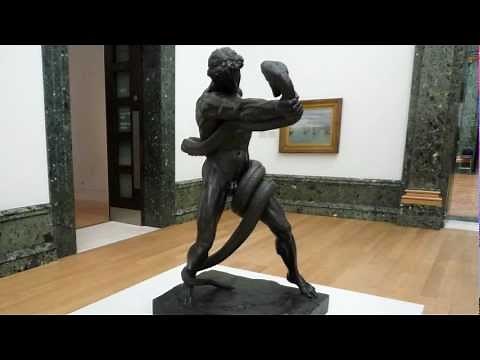 Leighton, an Athlete Wrestling with a Python