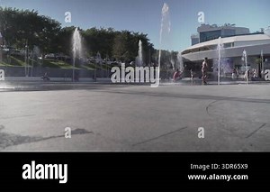 Ukraine, Odessa, August 25, 2021. Happy children playing and bathing in fountain in summer heat near sea beach in Odessa, Ukraine. Happy childhood. Kids excited and splashing water in the fountain Stock Video Footage - Alamy