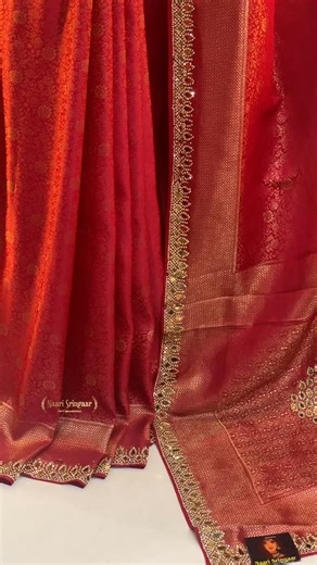 Naarisringaar (ethnic fashion) NEPAL on Instagram: "Draped in a cascade of vibrant ruby-red silk, this exquisite saree is a masterpiece of traditional craftsmanship, radiating bridal elegance and opulence. The fabric is richly adorned with intricate gold zari work and delicate embroidery, featuring sprawling floral vines and sparkling accents that catch the light beautifully. The grand, detailed borders and pallu showcase geometric patterns juxtaposed with the organic motifs, making it a perfect