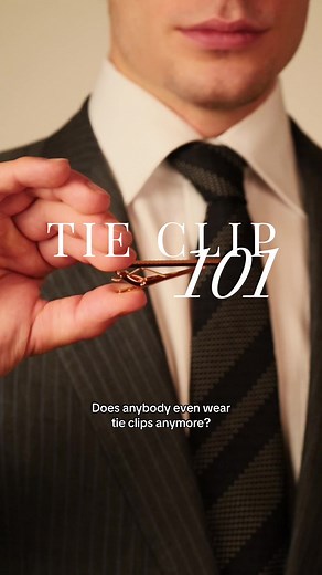 This is the SECRET to wearing a tie bar the RIGHT way: 1. Never wear a tie bar wider than your tie. A simple rule to keep in mind: A tie bar should be about 3/4 of the tie width. A full length tiebar could be okay for a retro look. 2. The key lies in the right placement of the tiebar. The tie bar should always be placed between the 3rd and 4th buttons of your shirt. 3. The tie bar doesn’t just clip onto the tie. The whole point is to keep the tie in place so it doesn’t move everywhere throughout