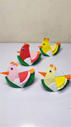 2.6K views · 12 reactions | Learn how to make adorable paper hens/chickens using basic colored paper and simple folds! Perfect for farm-themed activities, preschool classrooms, or weekend crafts at home. These rocking paper hens are fun to make and play with!  Materials: Colored paper, glue, scissors, googly eyes  Colors used: Red, pink, yellow, green, white, orange  Great for: Fine motor skills, color sorting, animal learning | MNS Crafts | Facebook