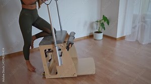 Comprehensive Pilates training session that includes essential posture correction. Exercises to improve mobility on a Pilates chair