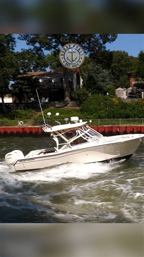 Grady White going against the current in the Point Pleasant Canal | Shore Boats