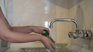 Young Woman Washing Cucumber Close Up Stock Video - Video of washing, indoor: 436992367