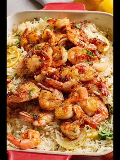 https://www.callmepmc.com/lemon-herb-rice-with-garlic-butter-shrimp/ This quick dinner recipe will elevate your weeknight dinner game with fresh flavors. Lemon Herb Rice paired with succulent Garlic Butter Shrimp combines the zingy brightness of lemon, the aromatic richness of garlic, and the savory goodness of shrimp, all served over fluffy jasmine rice infused with fragrant herbs. | Call Me PMc - Easy Recipes