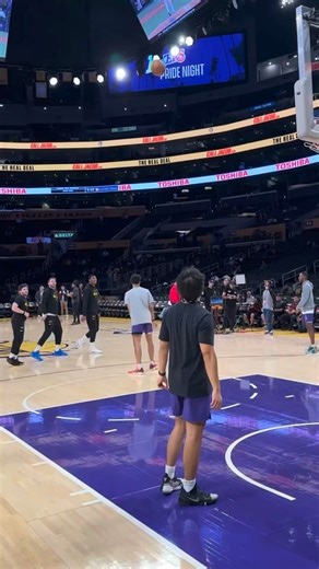 Luka Doncic shooting from the logo