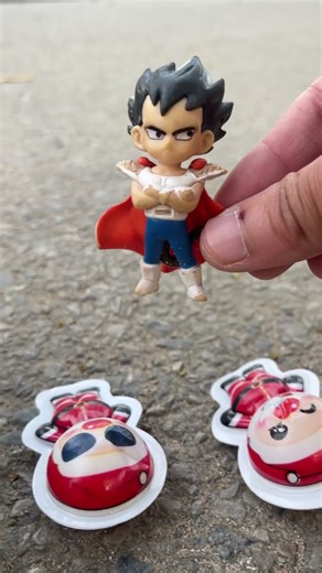 goku and vegete play in the bath , krillin stuck in the sand cry