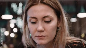 Girl eating at the restaurant using fork and knife. Slow motion Close-up.