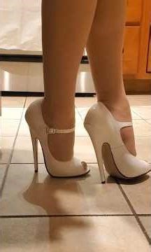 White 6 inch high heels with peep-toe