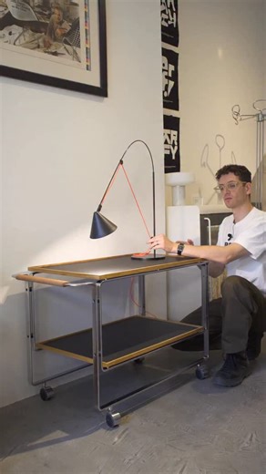 Rarify on Instagram: "Why would anybody want a desk lamp to bend? Stefan Diez designed the AYNO table lamp for Midgard, a German company. An ingenious adjustment ring anchors the lamp’s cord to hold a thin fiberglass rod in tension. While the design is contemporary and uses carbon fiber, the manufacturer Midgard was founded before 1920. Curt Fischer, Midgard’s founder, was among the first to invent articulated task lighting. Curt Fischer’s original task lamps were even used by Walter Gropius and