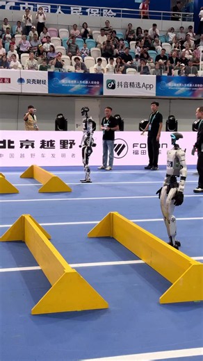 A humanoid robot clears one obstacle, then loses balance and crashes into the next barrier. This clip from the World Humanoid Robot Games shows how hard dynamic locomotion still is. The robot has to control foot placement, body pitch, momentum and recovery while moving through a course that gives it almost no room for error. A small timing mistake at the ankle, knee or hip can turn into a full-body fall in a fraction of a second. I kept replaying the moment before the fall. The robot is still mo