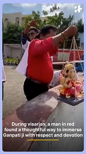305K views · 3.1K reactions | During Ganesh visarjan, while many chose quick immersions, one man in a red shirt won hearts with his thoughtful gesture. Instead of throwing, he gently lowered Ganpati ji into the water with respect and devotion. #GanpatiVisarjan #TrueDevotion #GaneshChaturthi #RespectfulVisarjan #FaithWithLove | Indiatimes | Facebook