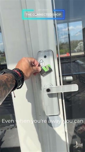 Glass-paneled swing door upgraded with our Smart Door Lock Pro