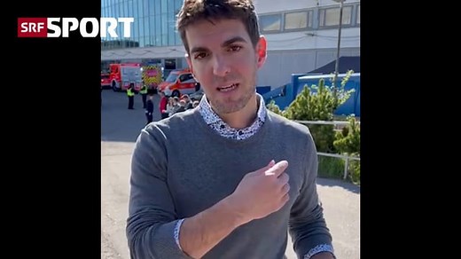 SRF-Reporter Ninck informiert über den Brand vor der Halle