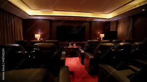An intimate home theater featuring plush seating and ambient lighting, ideal for a luxurious film experience.