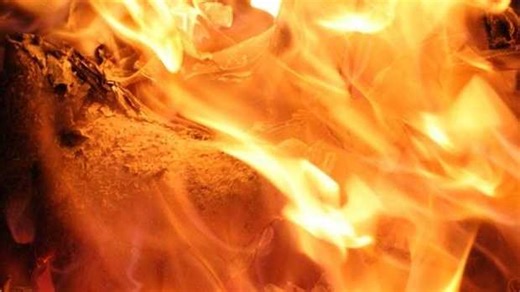 Vehicle fire damages home and outbuilding