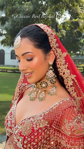 Priya Sharma | Makeup & Hair on Instagram: "A classic red bride wrapped in a dreamy veil, glowing with rich, royal, yet natural glam details. ❤️ Makeup: @makeupbypriyasharma Hair: @ruchikaverma7374 Outfit: @navneettandarpan Jewellery: @shivamgemsjaipur Assistant: @hair_byvinni Videography: @indiepictures.rb #makeupbypriyasharma #newdelhimakeupartist #luxurywedding #indianbride #beautifulbride #destinationbride #destinationwedding #bridalmakeup #weddingmakeup #cocktailmakeup #naturalmakeup #dewym