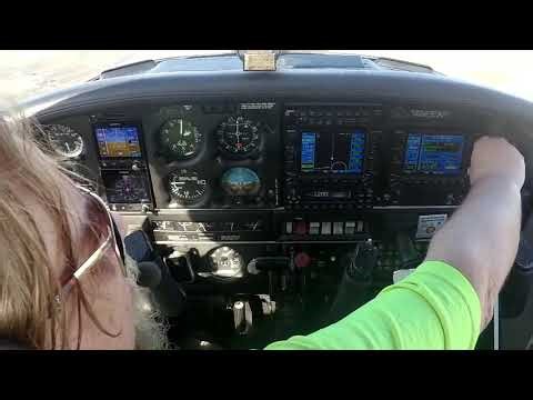 Full instrument landing from the hold to the approach and circle to land.