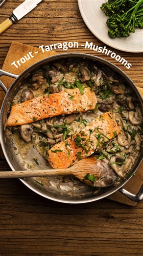 🍄 This cosy one-pan trout recipe is the perfect dish to warm you up on a cool autumn evening. Pan-Fried Trout with Mushrooms and Tarragon Serves 2 🐟 2 British trout fillets 🐟150g chestnut mushrooms, sliced 🐟 150g oyster mushrooms, torn 🐟 2 cloves of garlic, finely chopped 🐟 ½ glass dry white wine 🐟 80g butter 🐟 1 small onion, chopped 🐟 Salt and pepper 🐟Light olive oil – just a glug or two 🐟 A small sprig of parsley, chopped 🐟 A few stems of tarragon, chopped 🐟 1 tablespoon crème fra