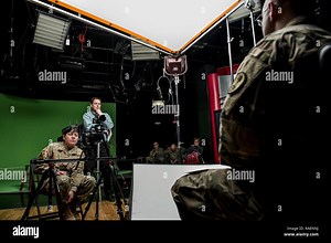 David Dummer (top), suicide prevention coordinator for the 200th Military Police Command, and Maj. Valerie Palacios, the command’s public affairs officer, conduct a video interview during a project organized by the 200th MP Command’s Suicide Prevention Program to document the stories of suicide survivors and those affected by the suicide of loved ones during a two-day shoot at the Defense Media Activity, Fort Meade, Maryland, Dec. 14, 2018. These stories will be used by the 200th MP Command for 