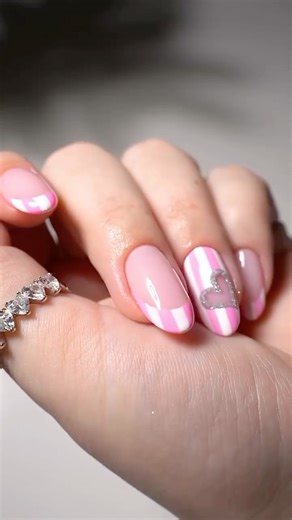 Kiara Sky Nails Official on Instagram: "Ok wait… striped glitter hearts?? 💕 This tutorial is way easier than it looks and the contrast is so good. True White keeps it crisp, Girly Pop adds the pop, and Iced Out reflective glitter does what it does every time.✨ Find everything at kiaraskynails.com | Link in Bio!📲 Look by: @_gelsbykels 💗 #kiarasky #kiaraskynails"