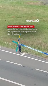 Peregrinação a pé até Aparecida: morador de Piracicaba carrega cruz de 10 metros