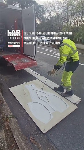 Spray painting road markings