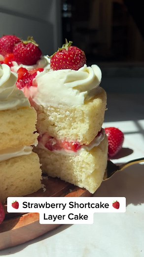 Our favorite version of the classic! Recipe on celebratingsweets.com. #strawberryshortcake #layercake #cakevideo #dessertrecipe