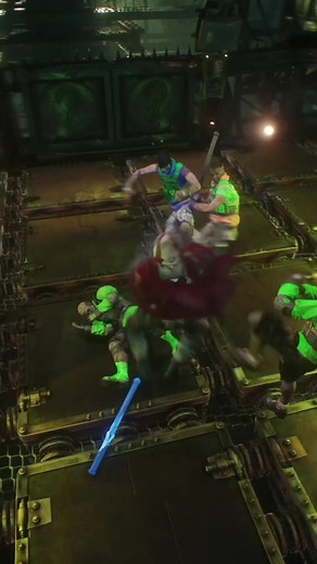 Azrael and Batman engage in a fierce brawl in Arkham Knight