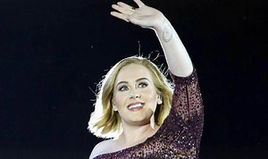 Adele wows crowds with song Hello at Wembley
