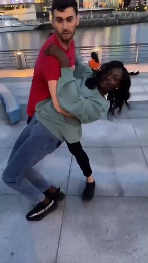 Wig Falls Off Woman's Head While Dancing - 1368842