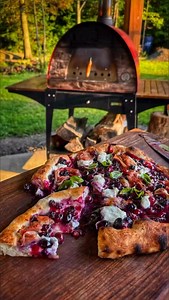 495K views · 368 reactions | Not traditional. Not sorry. Blueberry + prosciutto + goat cheese = chaos in crust form, wood-fired till the crust blisters, the goat cheese oozes, and the blueberries burst into jammy magic. Sweet, salty, smoky, and full-on wild. | GrillHunters | Facebook