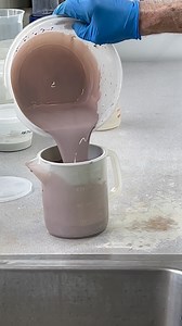 I was pretty sure that I had all the little pieces of clay out of the insides of these oil candles, but I wanted to be sure to not get any glaze on the pots with clay in it. The idea is, if you glaze the inside of an oil candle then as you pour the glaze back out if there are little pieces of clay in the candle, they will come back out with the glaze, and then if you use the glaze again, those little pieces will be on the inside of another oil candle. After glazing a couple of candles and having