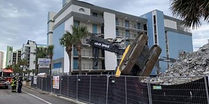 OSHA investigating excavator crash into Ocean Blvd. condo building