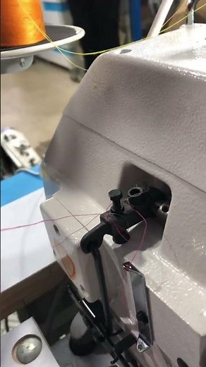 Interlocking machine threading process #interlockingmachine #interlocks #threads #thecometcouture