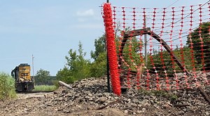 Homeowners 'a wreck' after CSX train jumps tracks, crashes into garage
