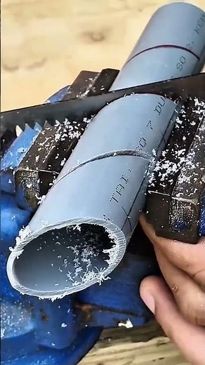 Techniques for Cutting PVC Pipes at Precise Angles Using a Vise and Saw