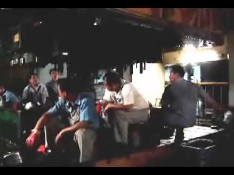Employees inside a steel press in China