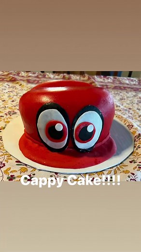 Another sculpted cake! This Cute little Cappy cake was for my Mario-loving nephew. It was a chocolate cake with chocolate frosting filling and covered in milk chocolate ganache and homemade fondant. | Megan Gray
