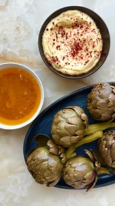 202K views · 819 reactions | Part one of our Artichoke Manual, a favourite spring vegetable of mine that I often feel is avoided by people just not having the confidence to prepare it. It’s simple, really. Simmer with lemons and bay leaves before serving with a tangy, citrus anchovy butter, or a pink peppercorn aoili. Coming Thursday, is how exactly to confidently eat it, too. | Ottolenghi | Facebook