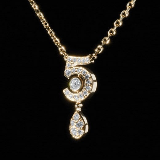 The savoir-faire of CHANEL Fine Jewelry. With COLLECTION N°5, CHANEL has paired gold with diamonds to trace the contours of the most iconic number: 5. Entirely set with diamonds, it shines like a ribbon of light. A precious drop of perfume is suspended at its curve, while a round close-set center diamond, a signature of the House since 1932, punctuates this creation with brilliance. All the savoir-faire and spirit of CHANEL captured in a fine jewelry collection where rigor and roundness combine