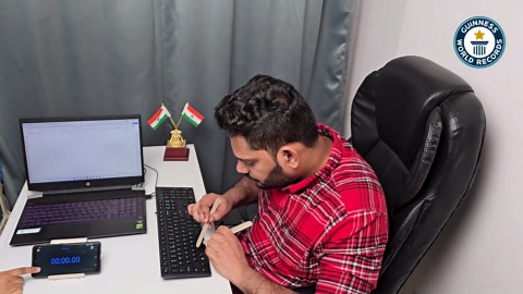 Typing alphabet backwards with ice lolly sticks record