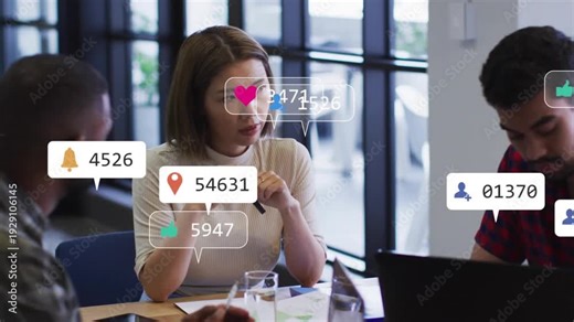 Woman at center tapping pen, leading campaign meeting while alerts entering right, obscuring papers