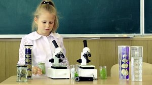 Little Girl Microscope Classroom Chalkboard Background First Former Interested Studying