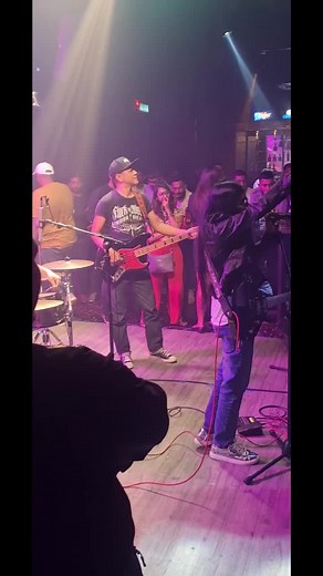 Live Music Performance with Band and Audience Interaction