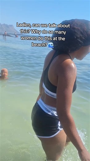 Ladies, can we talk about this? Why do so many women do this at the beach? 🌊